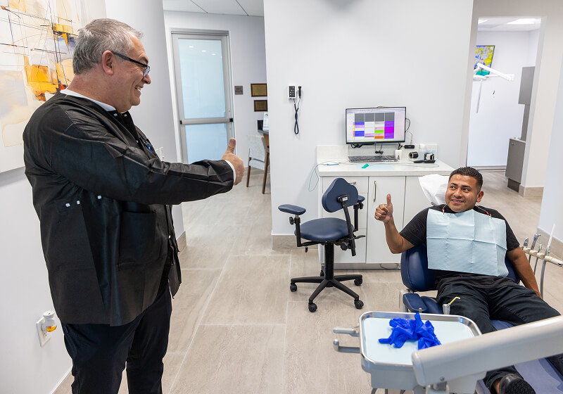 Dr. Farsio talking with a patient