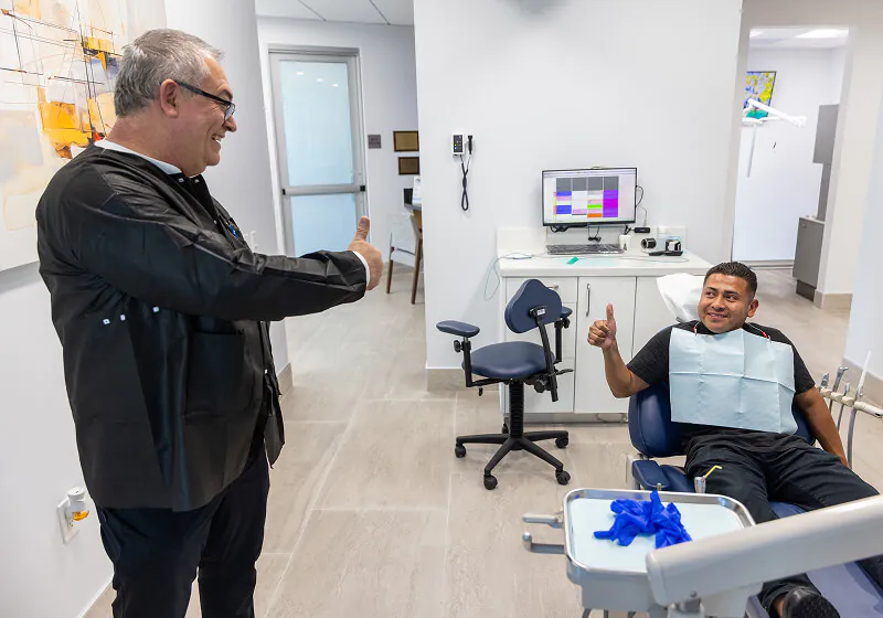 Dr. Farsio talking with a patient